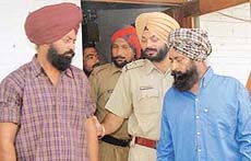 Lakhvir and Bhupinder, who have been arrested on the charge of shooting at a shopkeeper