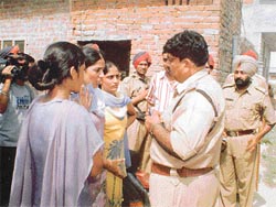 Representatives of DMC women employees try to convince the police about their innocence