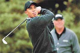 US golfer Tiger Woods drives from the 2nd tee