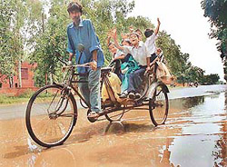 MEGHA RE MEGHA RE: Kids appear to be singing rain songs after the city witnessed some showers on Wednesday.