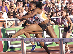 USA's Gail Devers clears a hurdle on her way to winning the women's 100 m hurdles event at the Stockholm grand prix athletics meeting on Tuesday.