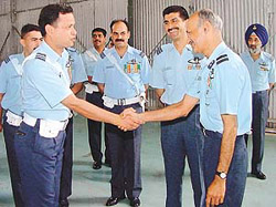 The new Station Commander, Air Officer Commanding (AOC), 12 Wing, Air Cdre Arun Gopi Nath (right), meets officers after taking over charge in Chandigarh on Thursday.