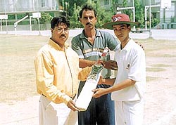 Priyank Shandilya receiving the Man of the Match award
