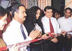 Mr Puneet Nanda, MD (right) and Mr Rajeev Duggal, Director, with Ms Suman Ranganathan at the opening of Cossets