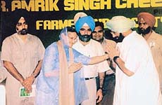 Punjab Chief Minister Amarinder Singh honours Mrs Raminder Kaur