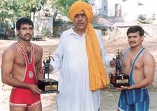 Captain Chand Roop with his Arjuna Award-winning disciples Ombeer Singh and Ashok Kumar.