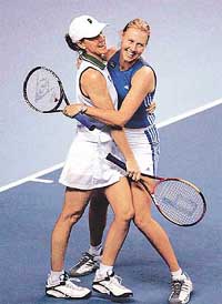 Australia�s Alicia Molik (R) and doubles partner Rennae Stubbs celebrate their win over the Netherlands� Kristie Boogert and Miriam Oremans 