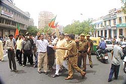 BJP activists trying to enforce the bandh in Connaught Place in the Capital on Monday