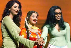 Former Miss World and actress Yukta Mookhey, actress Manisha Koirala and model-turned-actress Shweta Menon pose for photographers