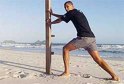 File photo of Brazilian and former Spanish club Barcelona soccer star Rivaldo Ferreira doing stretching exercises during a training session