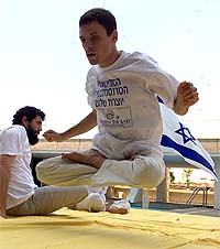 Alex Gobyenko of the International Meditation Society of Israel based in the northern Israeli village of Harrarit demonstrates yogic flying