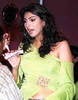 Yukta Mookhey prepares to give the muhurat shot