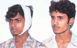 Jeetinder and Chandeshwar, who were allegedly assaulted and detained illegally by their employer.