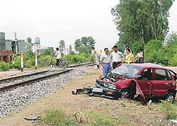 The car that collided with a speeding train at an unmannned crossing