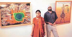 Bhawna Hasija and Manmeet Pal Singh display their paintings at the Government Museum and Art Gallery 