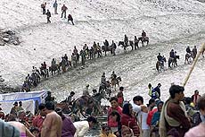 Devotees cross a glacier