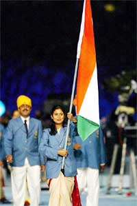 Indian Anjali Bhagwat carries the flag