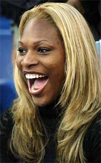 Serena Williams smiles after being introduced before a crowd