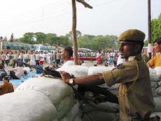 Security personnel keep a strict vigil