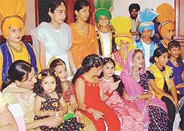 Budding artistes await their turn to take part in "Nachde Sitare", a dance competition, in Ludhiana on Sunday.