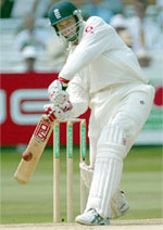 England batsmen John Crawley his a ball on his way to his century