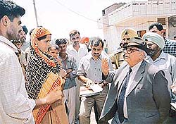 Lieut-Gen J.F.R. Jacob talking to residents