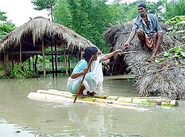 A woman tries to help her husband