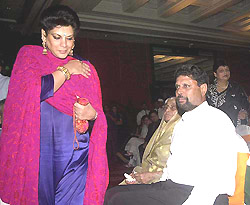 Romi Dev, wife of all-rounder Kapil Dev comes to attend a felicitation function 