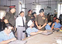 Chief of the Western Command, Lieut-Gen S.S. Mehta, talks to a soldier at the Paraplegic Rehabilitation Centre in SAS Nagar on Wednesday.