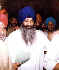 Former Punjab PWD Minister Sucha Singh Langah being produced at a Kharar court