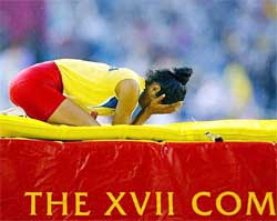 India's Bobby Aloysius reacts after failing to clear the bar