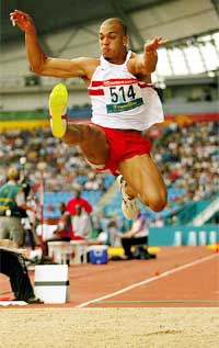 England's Nathan Morgan jumps into the pit