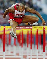 Colin Jackson from Wales competes in the men's 100 metre hurdles 