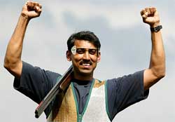India�s Rajyavardhan Singh celebrates after winning gold medal