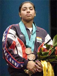 India's Sunaina Sunaina poses with her three bronze medals