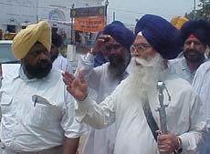 SGPC chief Kirpal Singh Badungar arrives at a religious function in Ambala on Friday.