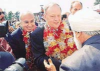 Prime Minister Jean Chretien is greeted as he takes part in a heritage designation ceremony at a gurdwara