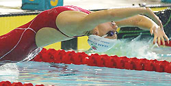 England�s Sarah Price gets a flying start in the final of the women�s 100m back stroke at the 2002 Commonwealth Games in Manchester on Thursday.