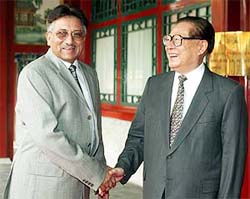 Chinese President Jiang Zemin greets Pakistan President Pervez Musharraf