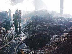 Fire-fighters at a cycle parts factory in Focal Point where a massive fire broke out in the wee hours in Ludhiana on Saturday.