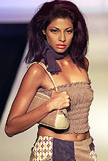 A model displays an outfit