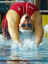 England's Sarah Price pushes off at the start of the women's 50m backstroke semifinal