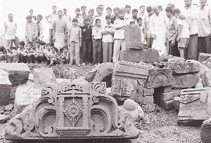 Residents of Rampur Jangi village stand near the excavation site of an ancient Panchayatan style temple.