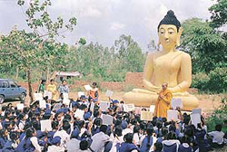 Students of Government High School, Khuda Ali Sher, at a prayer meeting for world peace on Tuesday.
