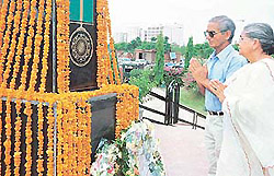 Parents of Major Sandeep Shankhla pay homage at his memorial in Sector 2, Panchkula, on Thursday.