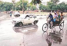 Friday afternoon showers bring relief to city residents. 