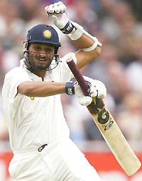 Harbhajan Singh celebrates his half century against England on the third day of the second Test at Trent Bridge in Nottingham on Saturday.