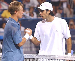 Lleyton Hewitt of Australia (left) and Fernando Gonzalez of Chile greet each other at the net after their semifinal match at the Cincinnati Masters Series