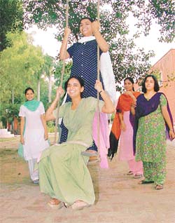 Students of the Government College for Women, Ludhiana, have a �swinging time� 