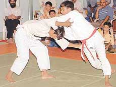Anil (right) overpowers Vikram to lift the below-50 kg-section title in the Chandigarh Sub-Junior Judo Championship 